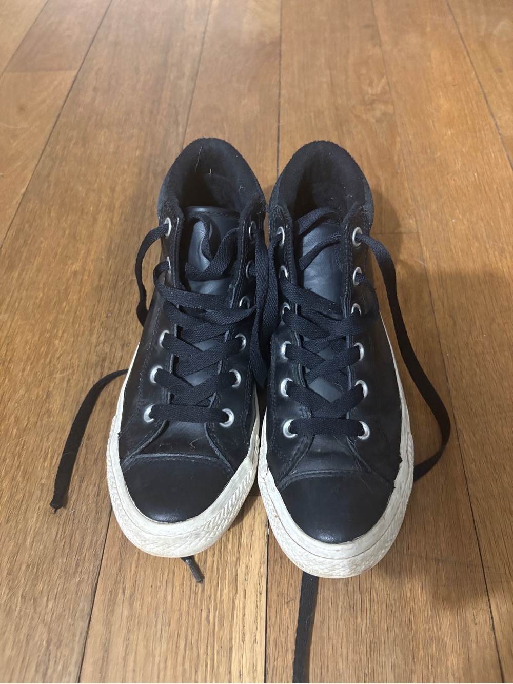 Converse black leather sneakers